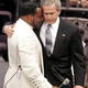 Bishop Long in better times. Conferring with President George W. Bush at Coretta Scott King's funeral.